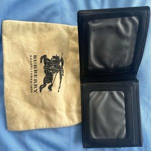 Burberry, men’s wallet, card holders side is ripped as you see in the picture